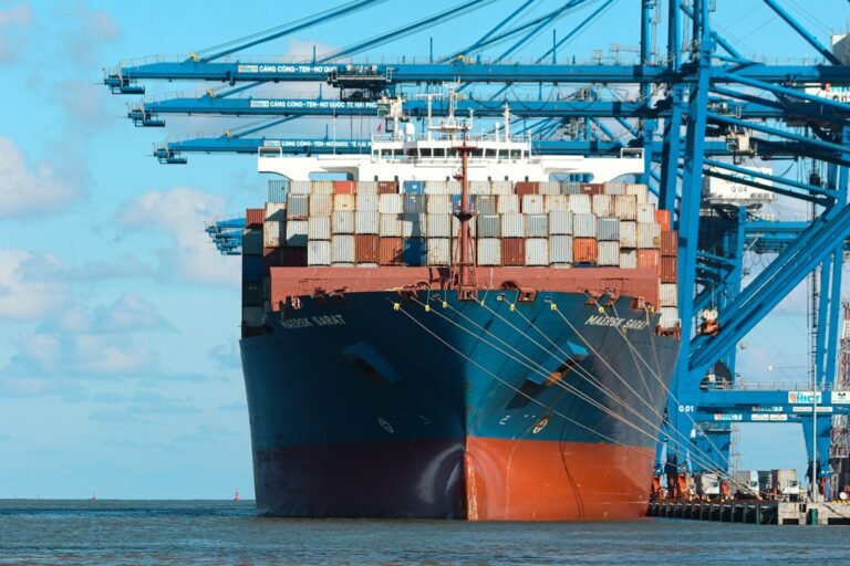 a large cargo ship at a dock