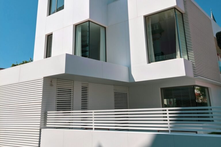 white concrete building under blue sky during daytime